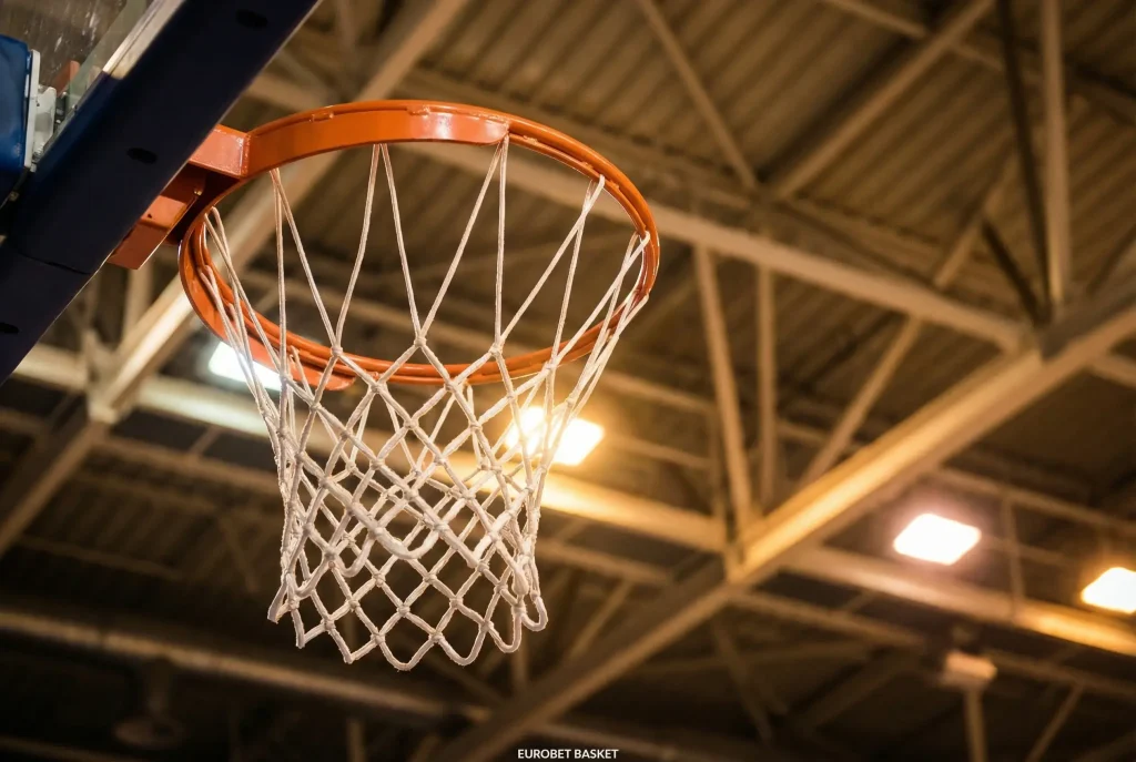 Eurobet scommesse basket: canestro da basket con rete e sfondo di arena sportiva